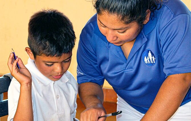 teacher with student